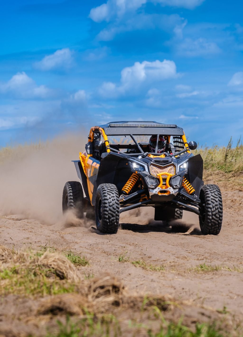 UTV buggy and 4x4 off road vehicle in a sandy track. Buggy extreme riding